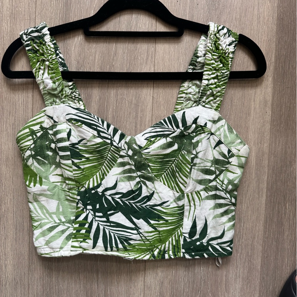 Crop top with smocking in the back. Size small